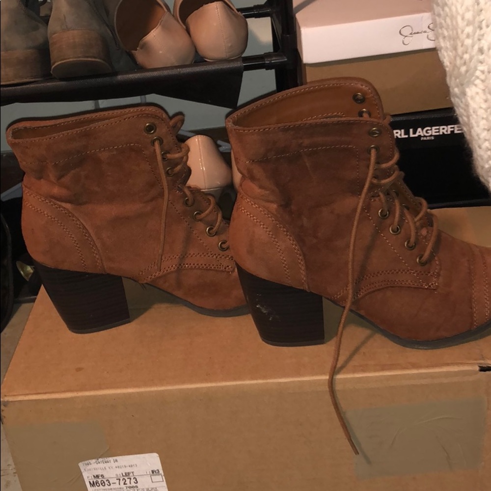 Size 7 brown boots worn once.